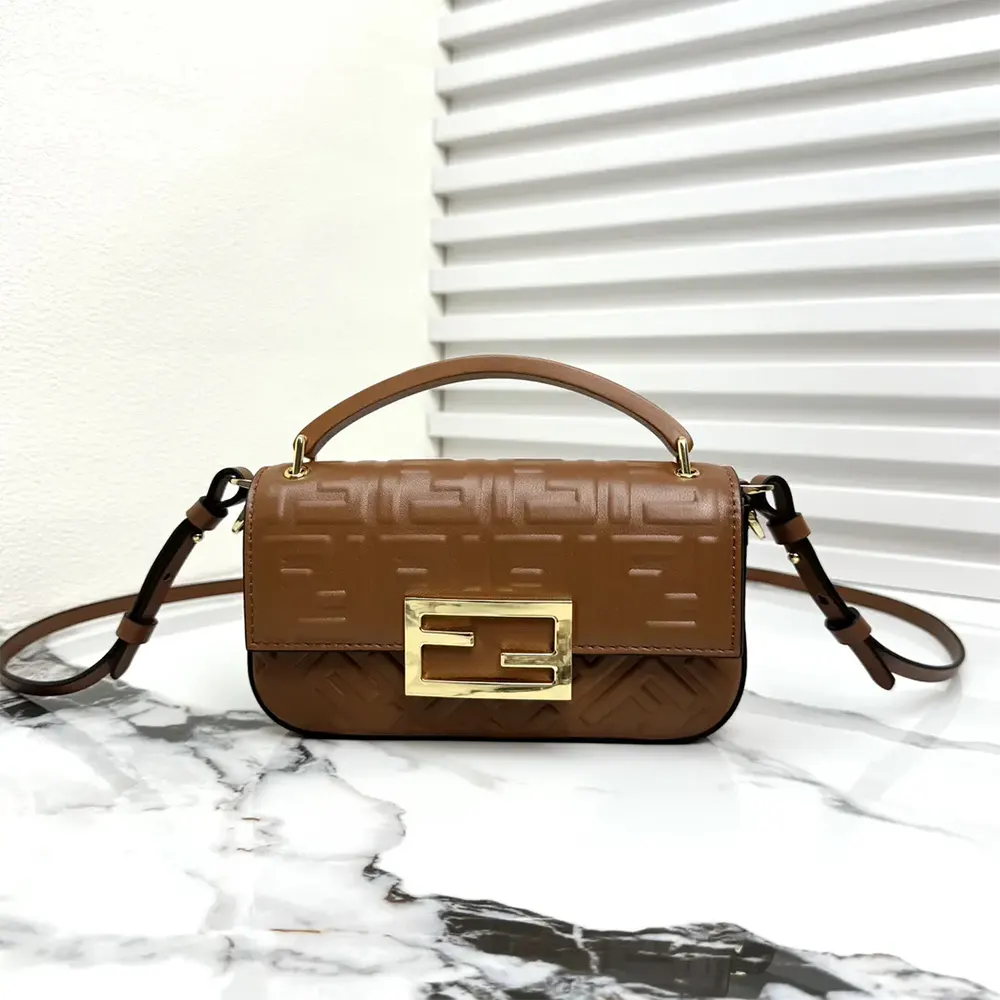 Close-up of gold hardware on Fendi Women Baguette Phone Pouch Brown Nappa Leather Pouch
