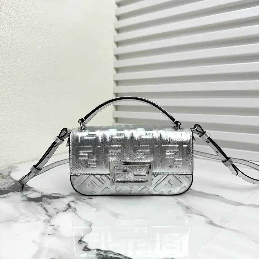 Close-up detail of gold-tone hardware on Fendi Women Baguette Phone Pouch