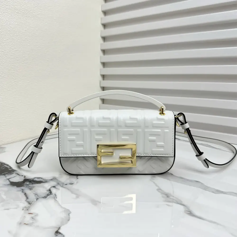 Close-up on gold hardware and flap of Fendi Women Baguette Phone Pouch