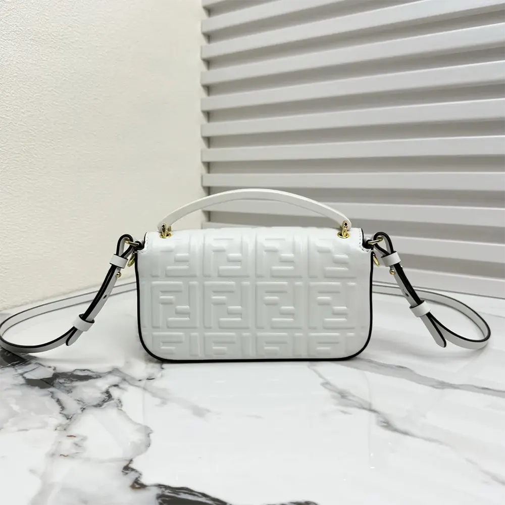 Side profile showing slim silhouette of Fendi Women Baguette Phone Pouch