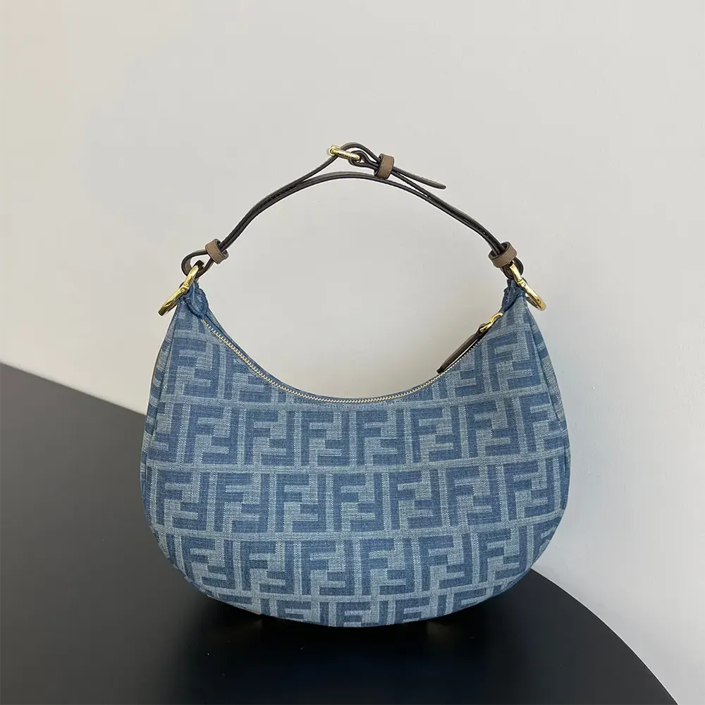 Close-up of gold hardware and FF print on Fendi denim bag