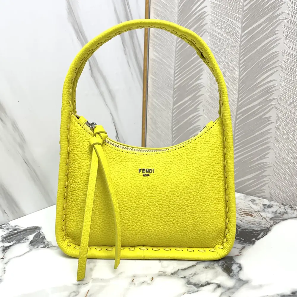 Close-up of 264 hand-sewn topstitches on Fendi Mini Fendessence bag