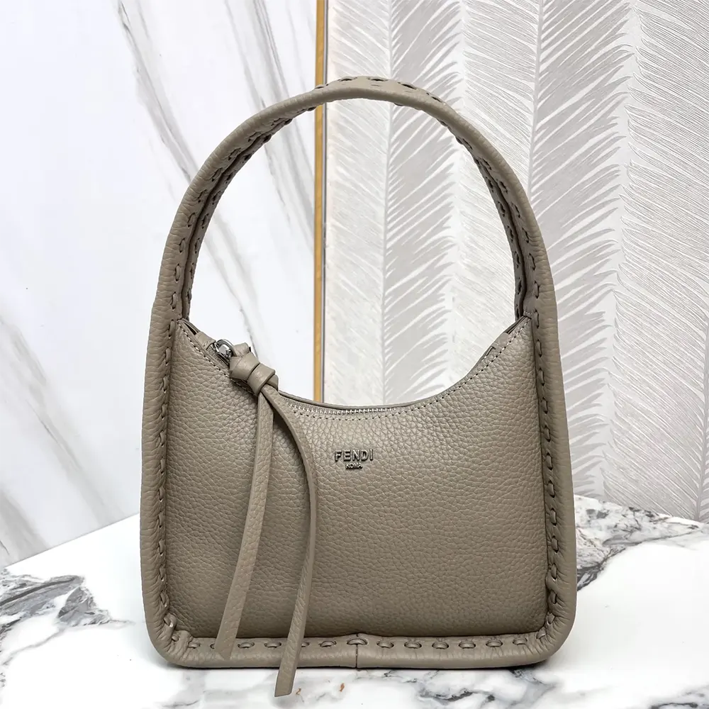 Close-up of 264 hand-sewn topstitches on Fendi Mini Fendessence bag