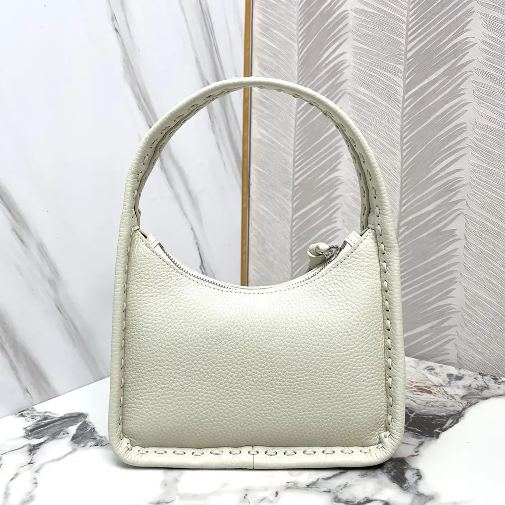 Side profile of Fendi Mini Fendessence Small Ice White Selleria Bag