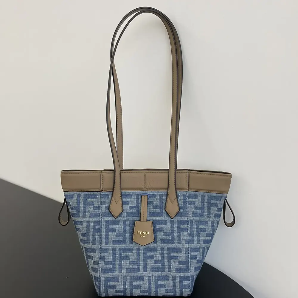 Close-up detail of gold-tone hardware on Fendi Women Origami Mini Light Blue bag