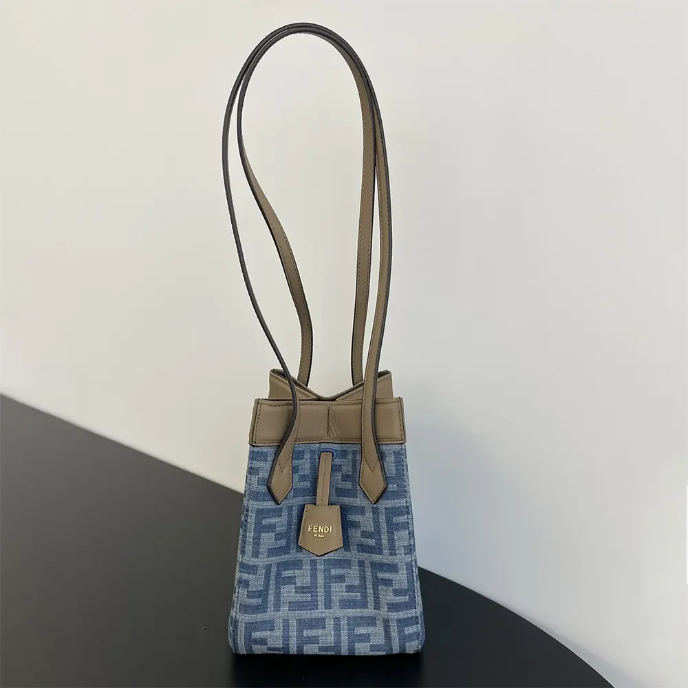 Side profile showing transformation feature of Fendi Women Origami Mini Light Blue bag
