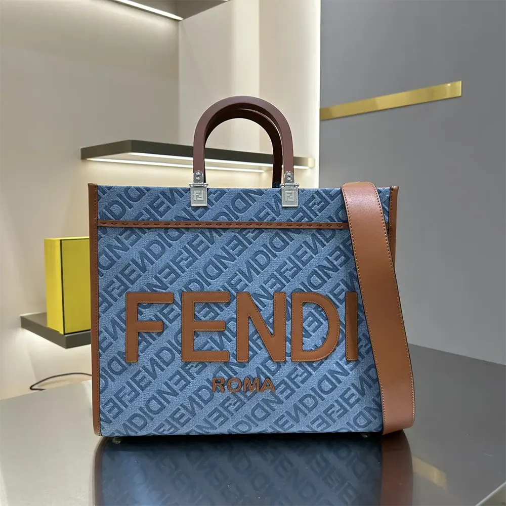 Close-up of gold-tone hardware on Fendi Sunshine denim shopper bag