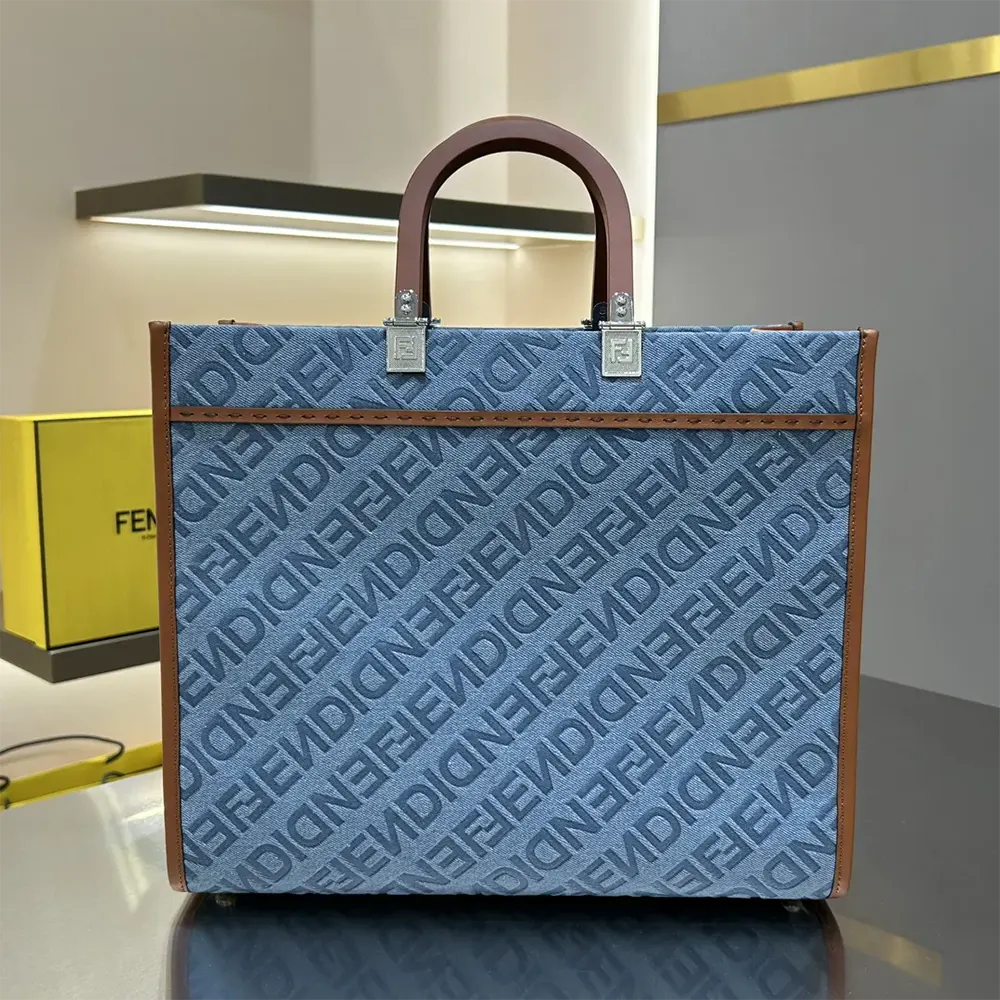 Side profile showing silhouette and handles of Fendi Women Sunshine bag