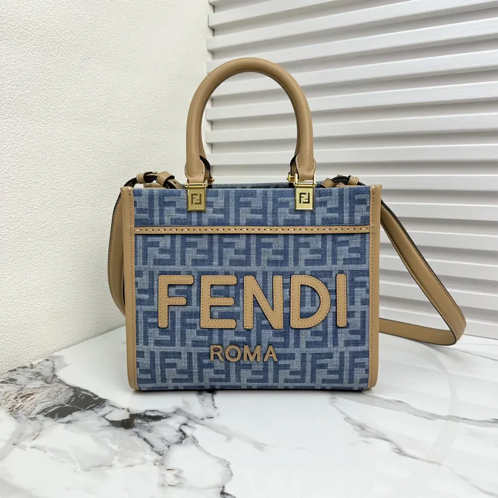 Close-up on silver-tone hardware and FF logo on Fendi denim shopper