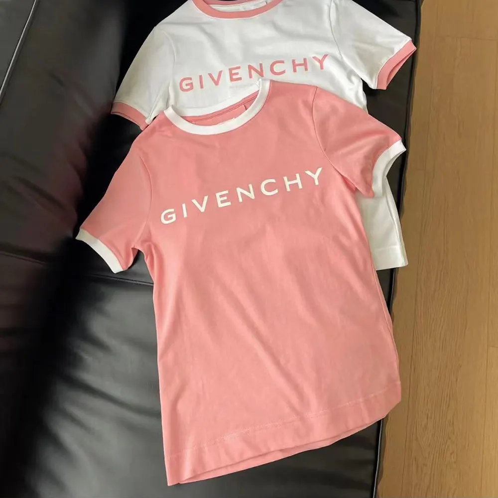Close-up of Givenchy logo and white trim on slim fit t-shirt