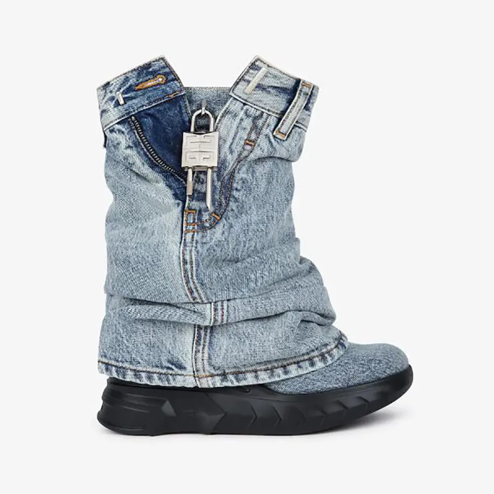 Side view of Givenchy Women Shark Lock Biker Ankle Boots in Jeans showing zipper