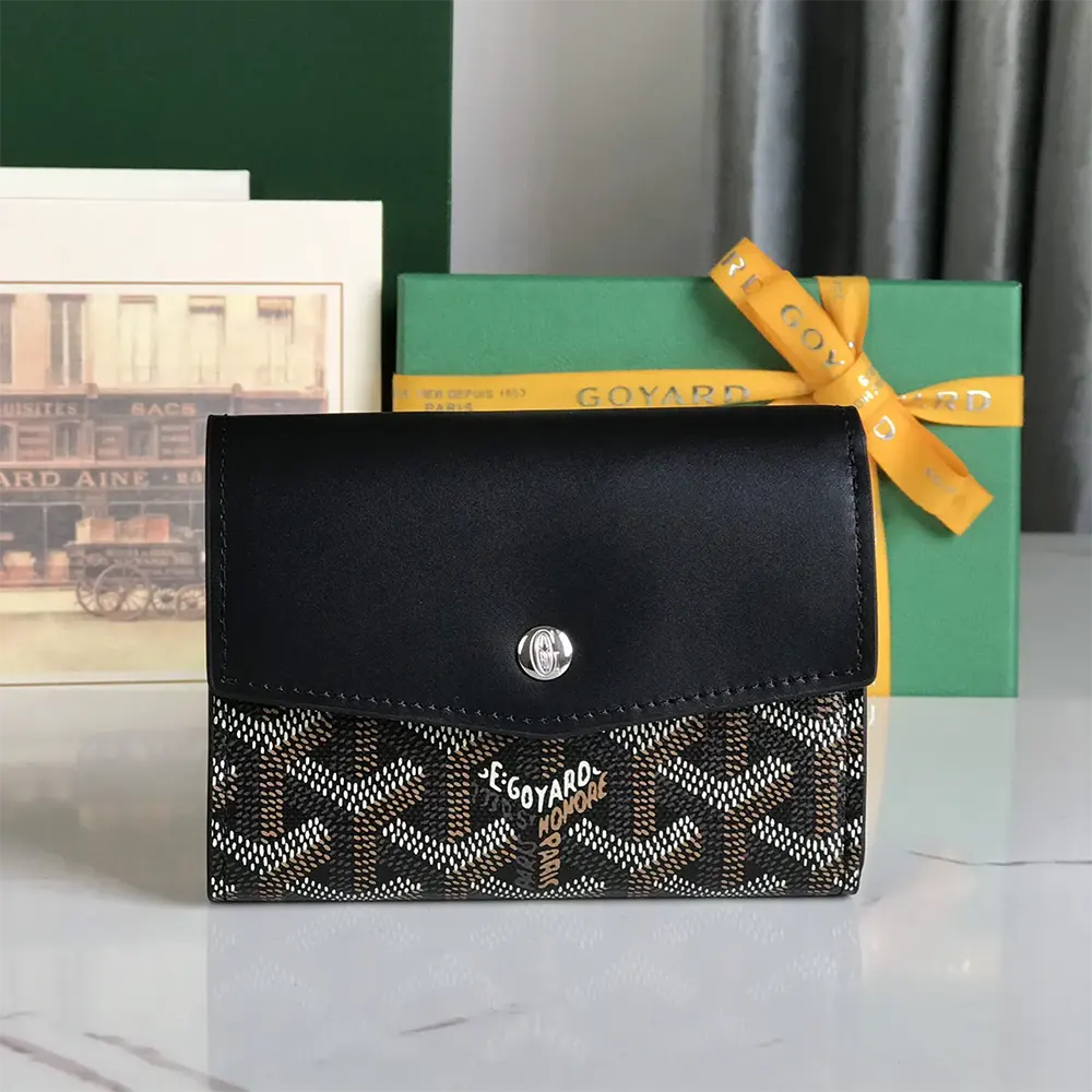 Close-up of brass hardware and leather trim on Goyard Saint Gabrie Wallet-Black