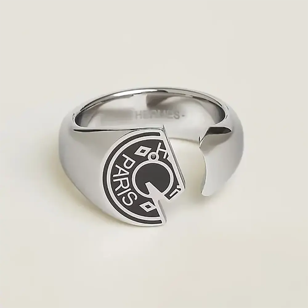 Close-up of Hermes Unisex Carrousel Ring showing engraved motif