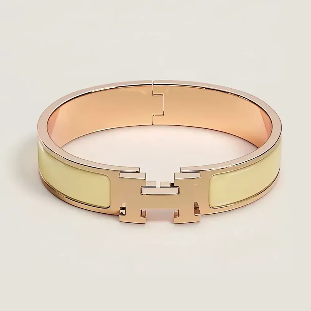 Hermes Unisex Clic H Bracelet-Yellow front view showing signature H clasp