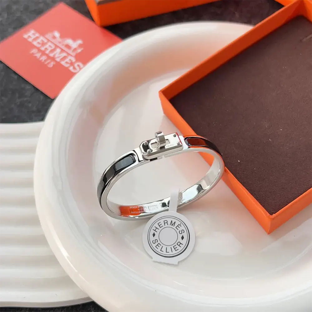 Side angle of Hermes Unisex Mini Clic Kelly Bracelet-Black clasp detail