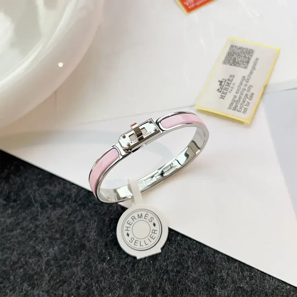 Hermes Unisex Mini Clic Kelly Bracelet-Pink showing glossy pink enamel finish