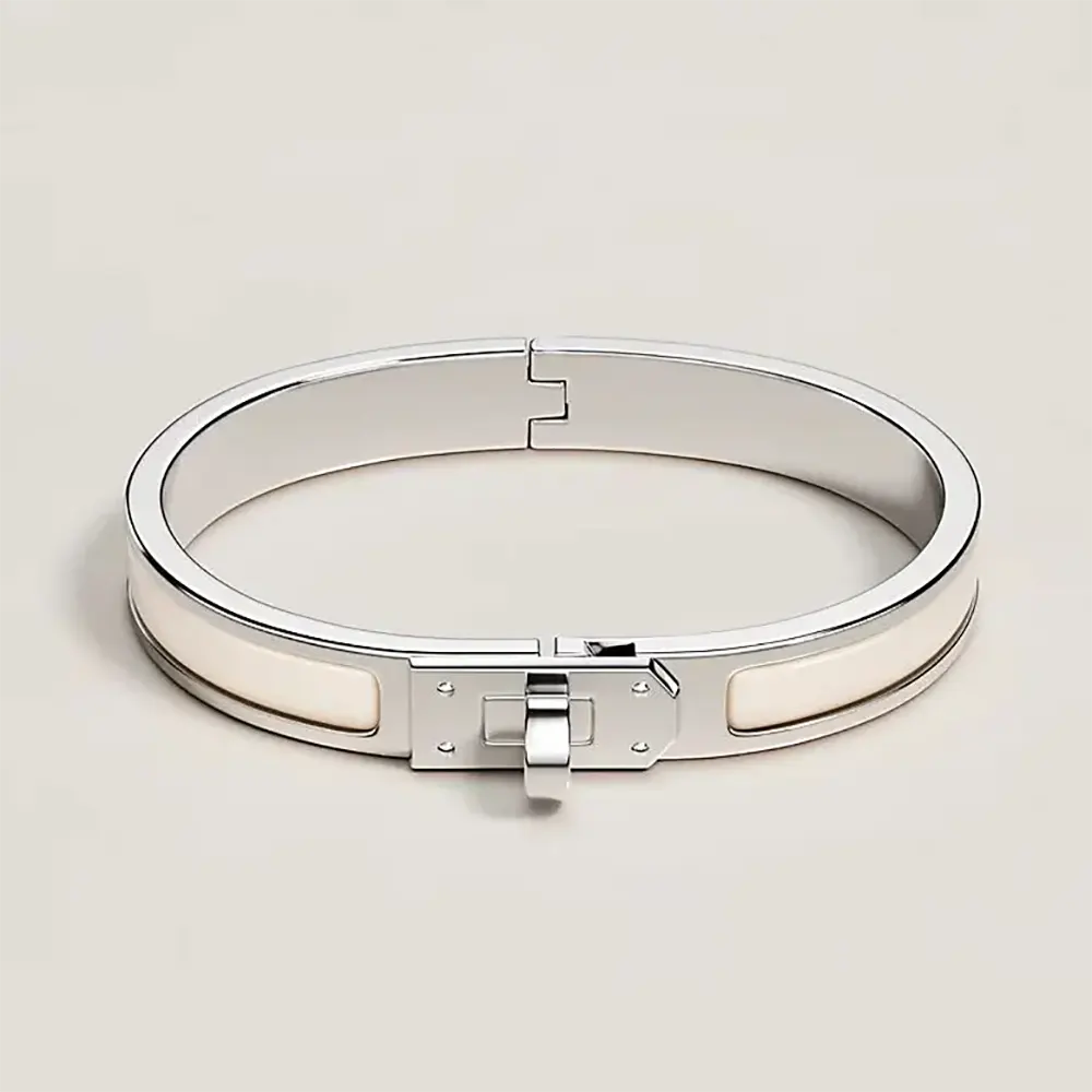 Close-up of Hermes Unisex Mini Clic Kelly Bracelet-White clasp detail