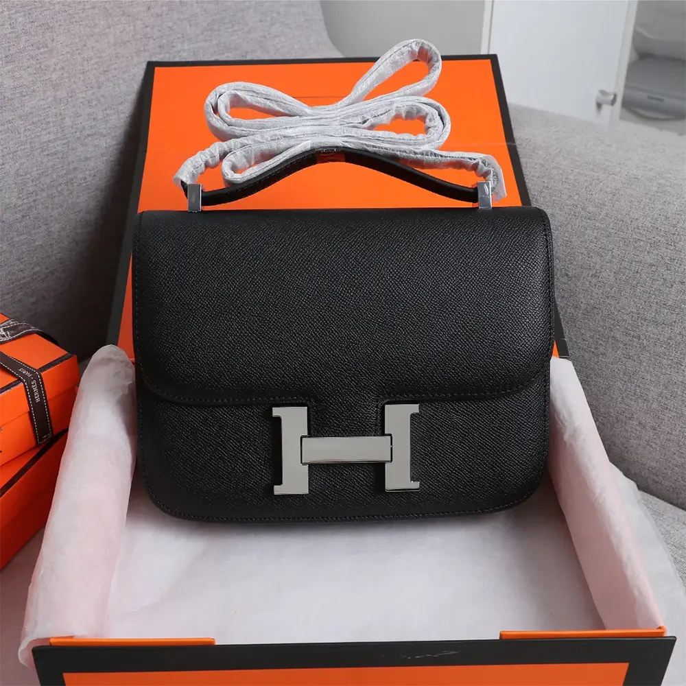 Close-up of silver H clasp on Hermes Women Constance 18 Bag