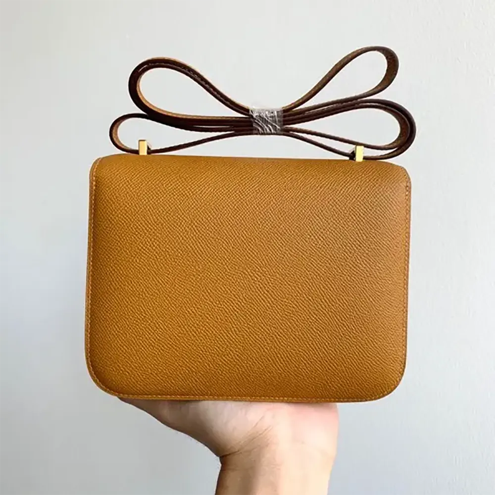 Side angle showing structured shape of Hermes Women Constance 18 Bag