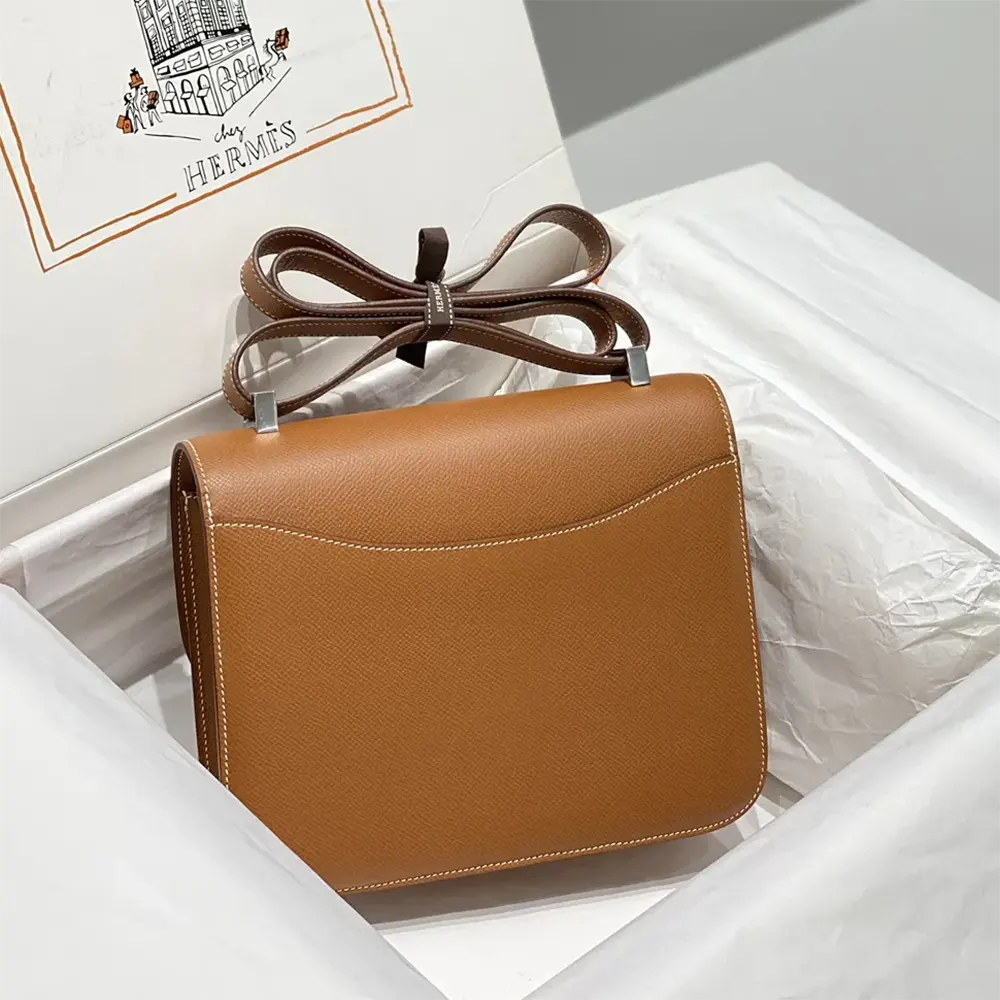 Side angle showing structured silhouette of Hermes Women Constance 18 Bag