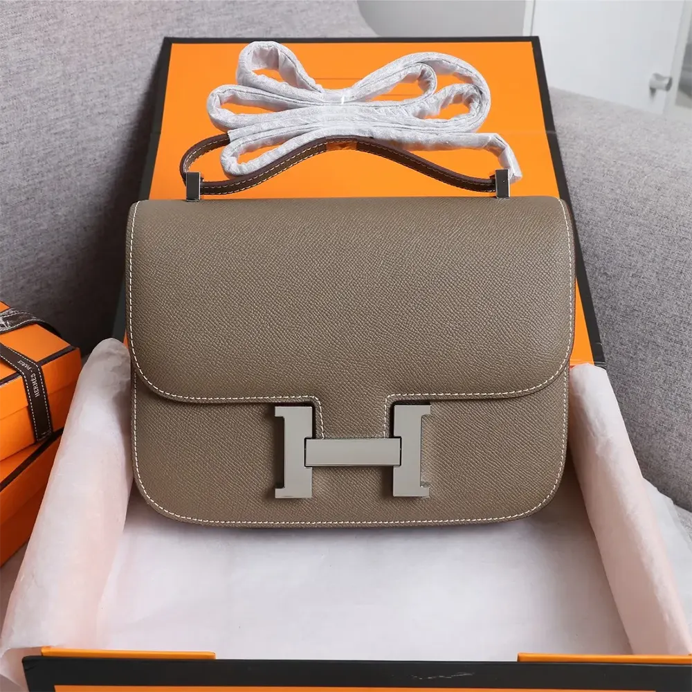 Close-up of silver H clasp on Hermes Women Constance 19 Bag