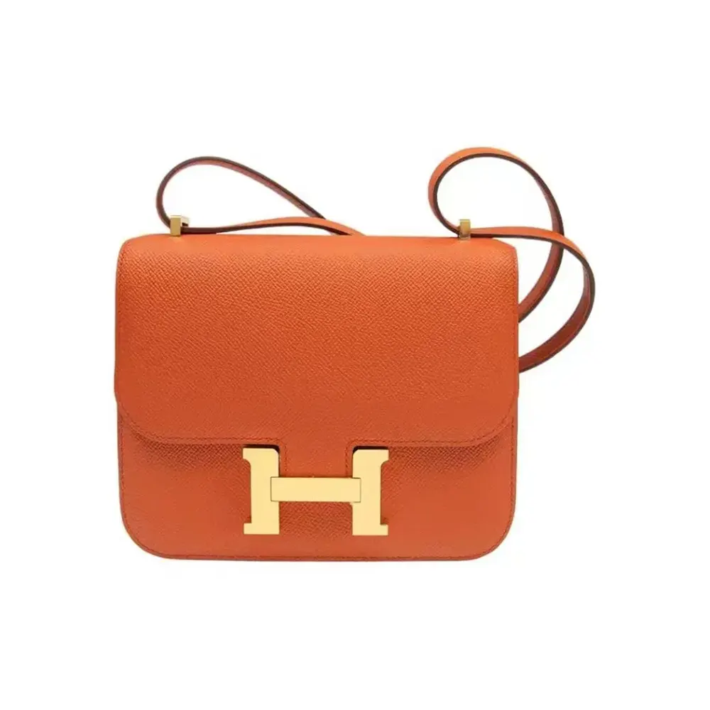Front view of Hermes Women Constance 18 Bag in orange leather