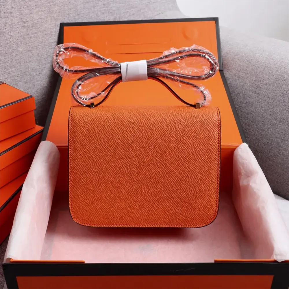 Side profile showing structured shape of Hermes Women Constance 18 Bag