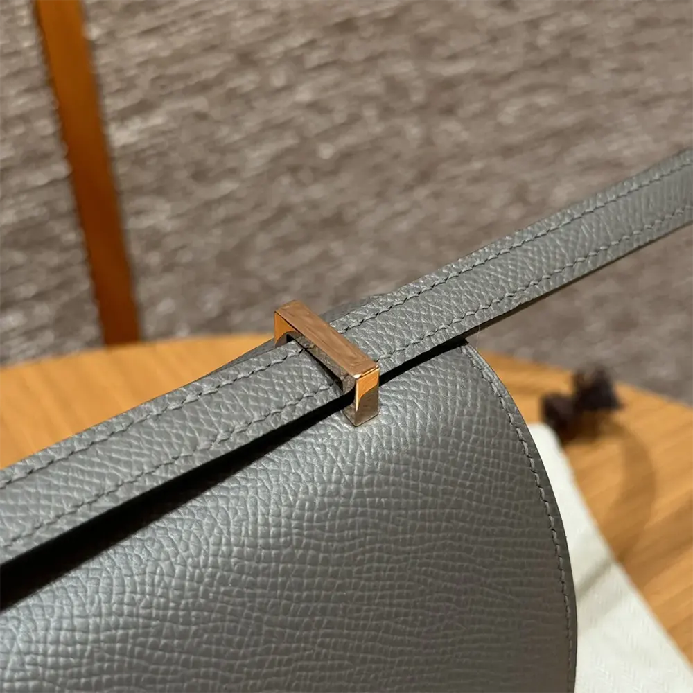 Side angle showing structured silhouette of Hermes Women Constance 18 Bag
