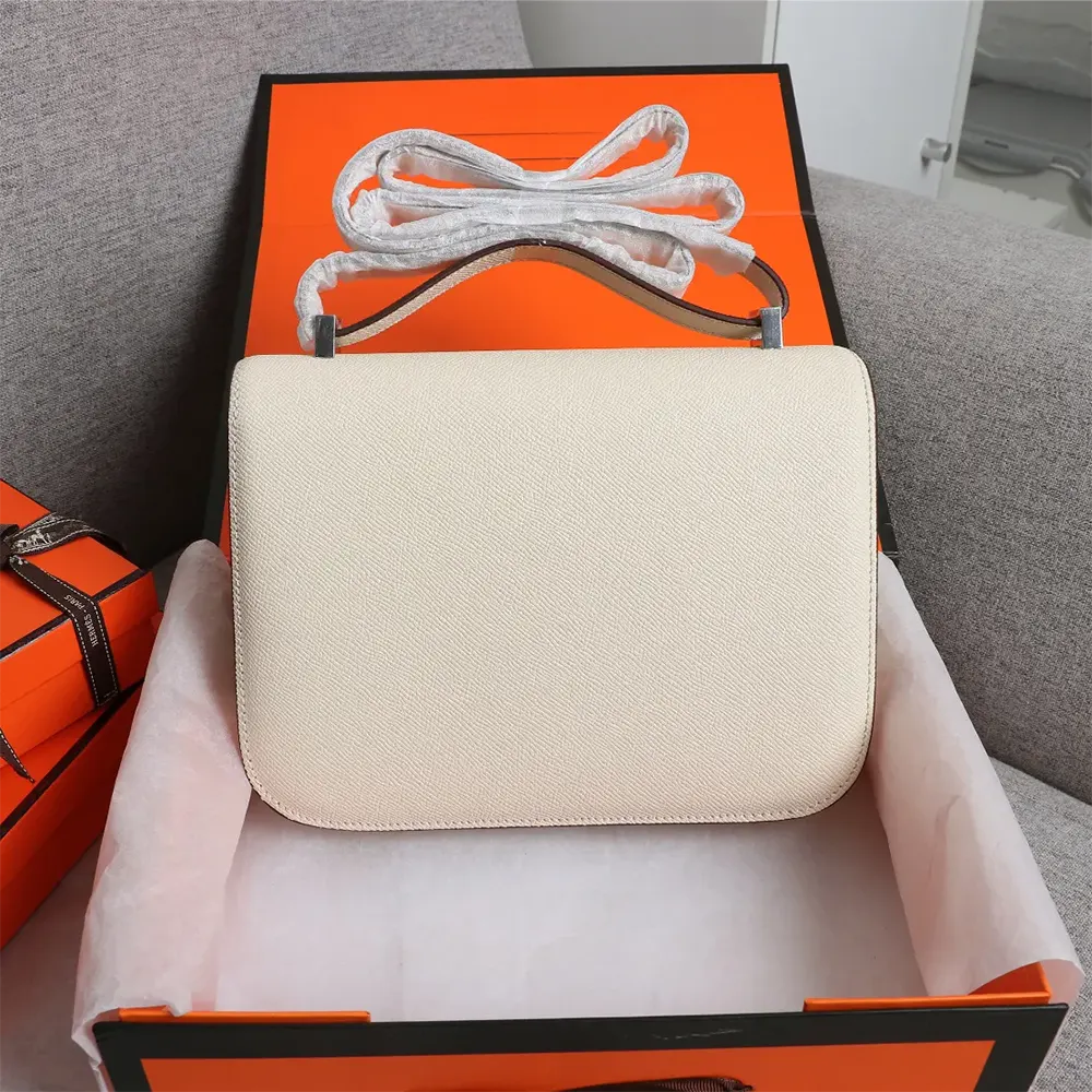 Side profile showing structured silhouette of Hermes Women Constance 18 Bag