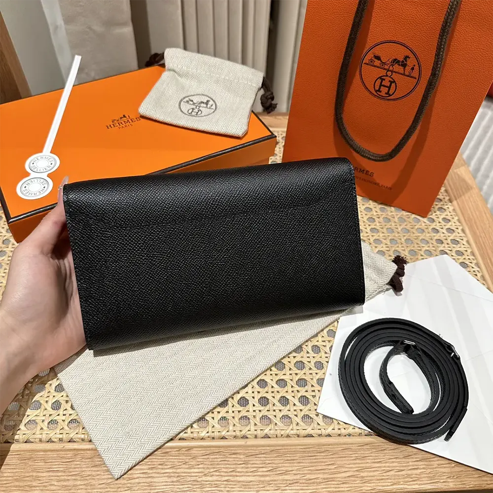 Side angle showing slim silhouette of Hermes Women Constance Long To Go