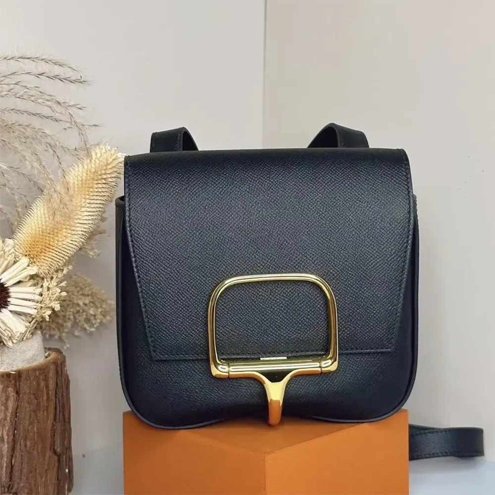 Close-up of gold hardware on Hermes Women Della Cavalleria Mini Bag