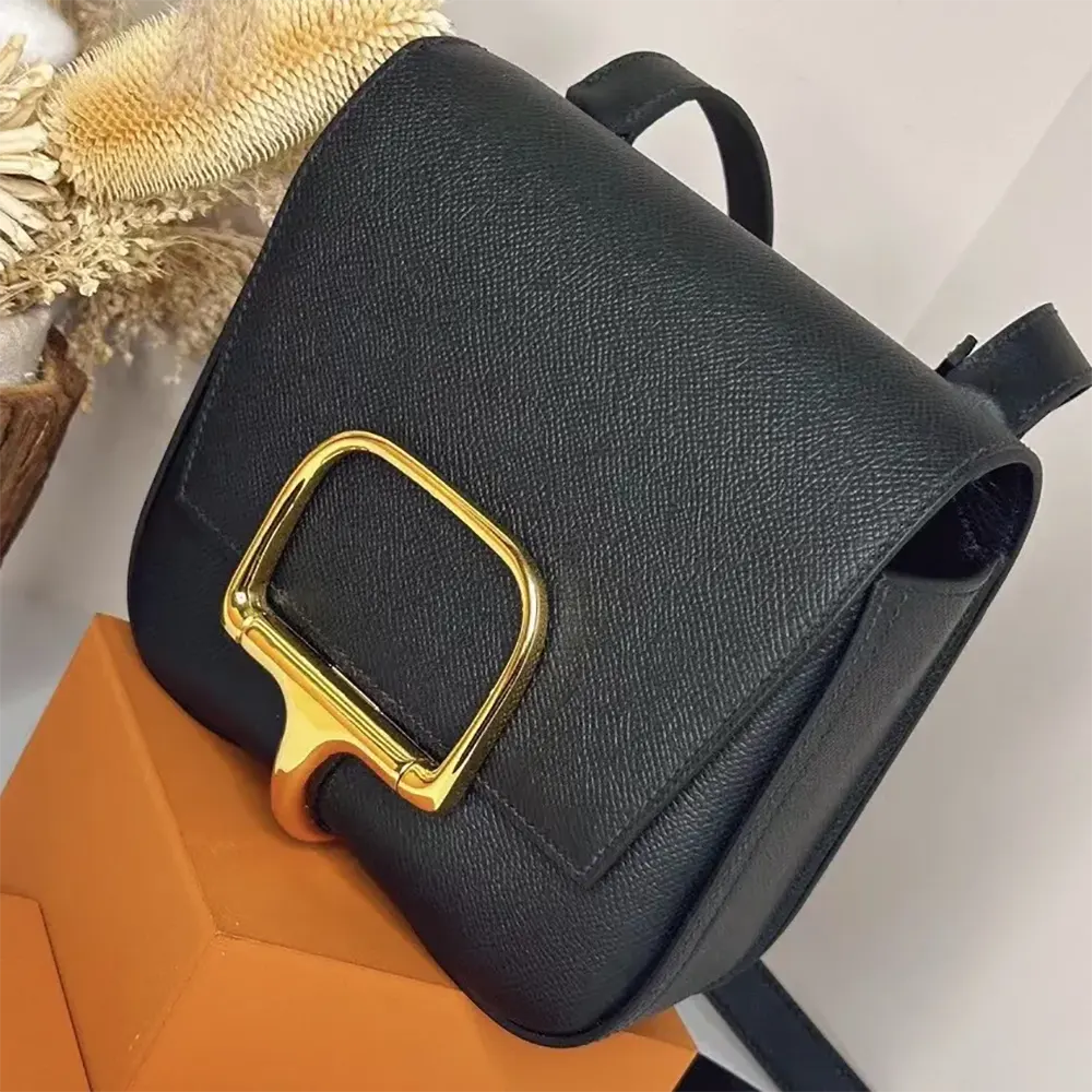 Side angle showing silhouette of Hermes Women Della Cavalleria Mini Bag