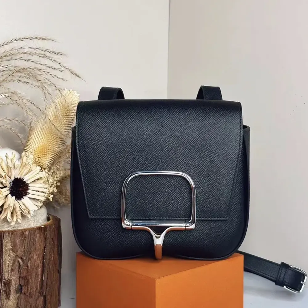 Close-up of silver clasp on Hermes Women Della Cavalleria Mini Bag