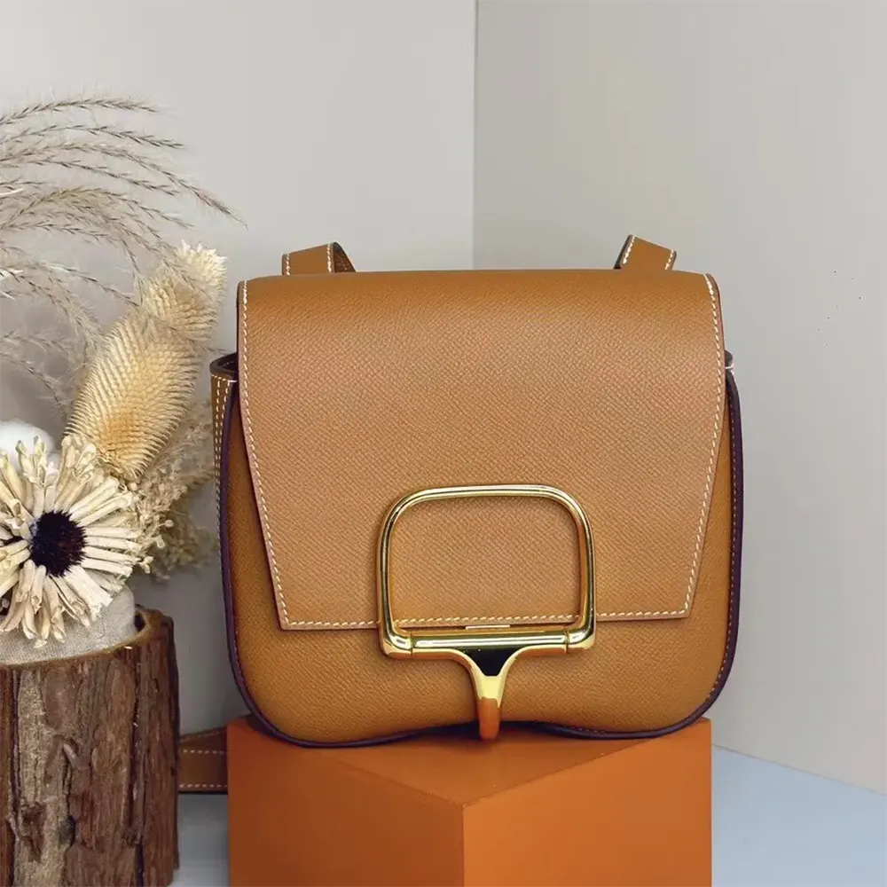 Close-up of gold hardware on Hermes Women Della Cavalleria Mini Bag