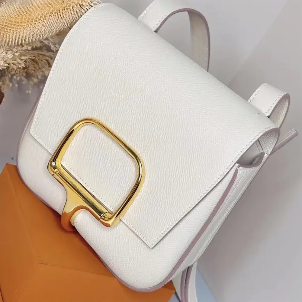 Side angle showing structured silhouette of Hermes Women Della Cavalleria Mini Bag