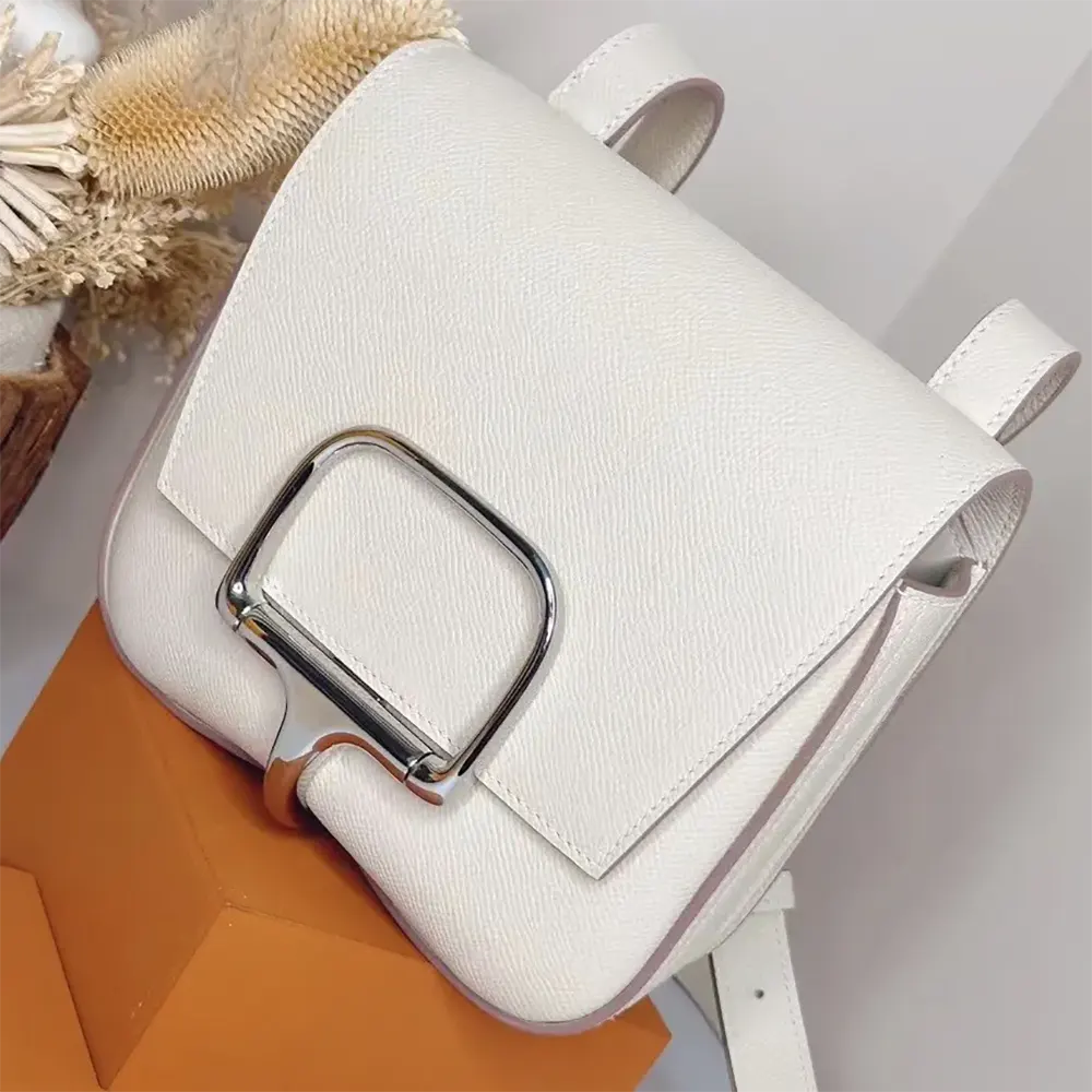 Side profile showing silhouette of Hermes Women Della Cavalleria Mini Bag