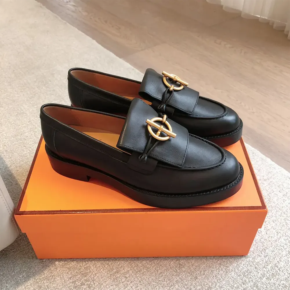 Top view showing sleek silhouette of Hermes Women Impact Loafer black leather