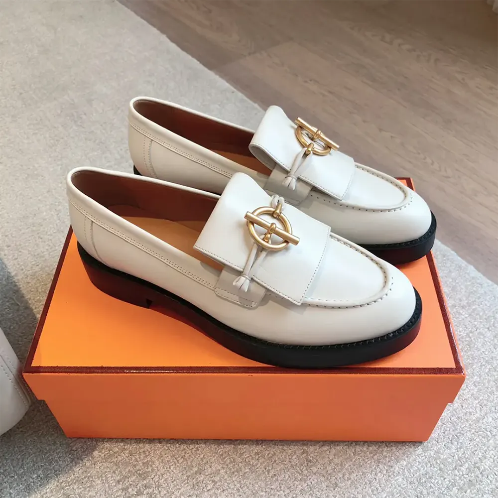 Side profile showing sleek silhouette of Hermes Women Impact Loafer