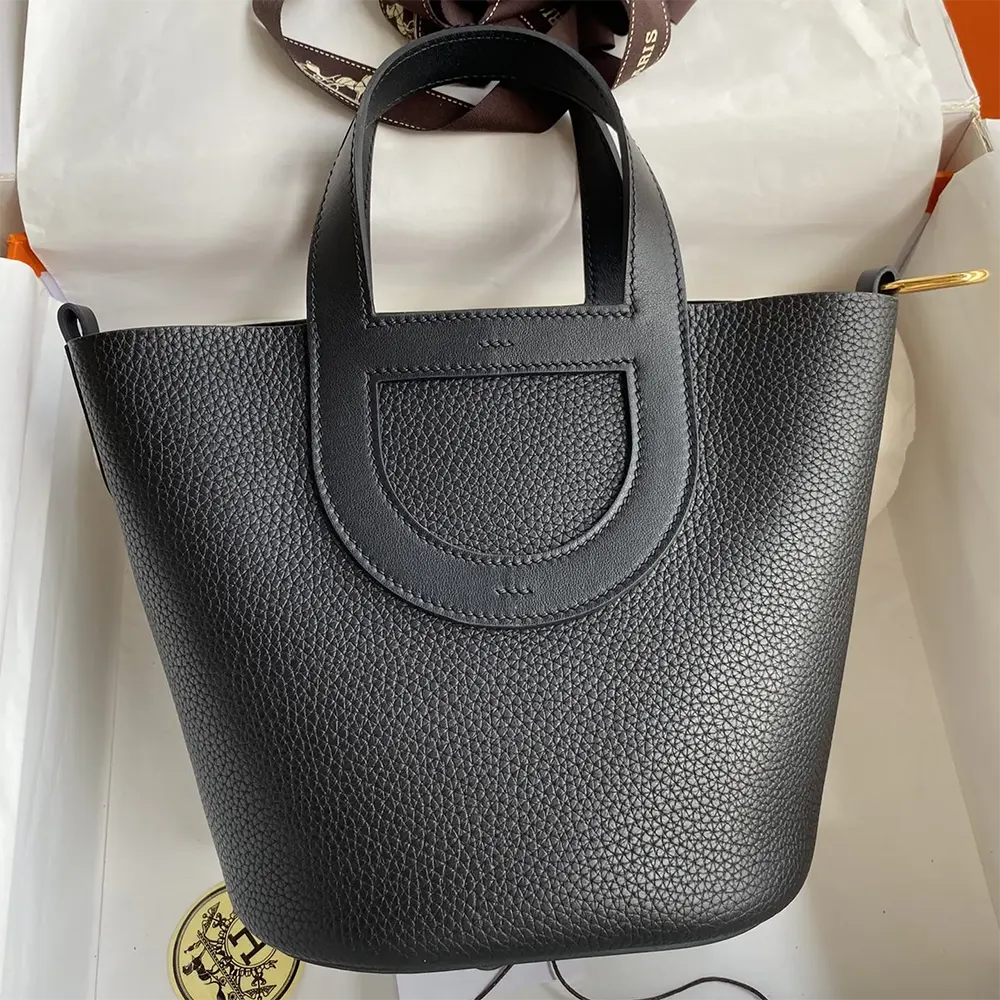 Close-up on gold hardware detail of Hermes Women In the Loop 18 Handbag