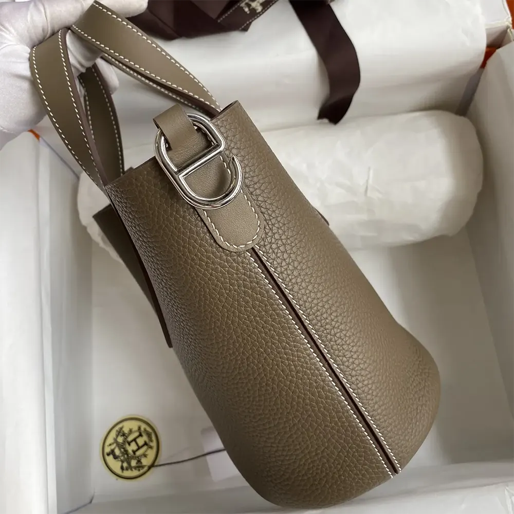Side profile showing sleek silhouette of Hermes Women In the Loop 18 Handbag