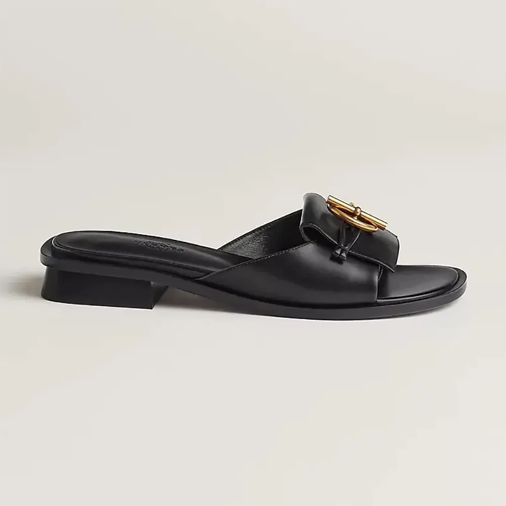 Front angle of Hermes Women Isle Sandal in black calfskin leather
