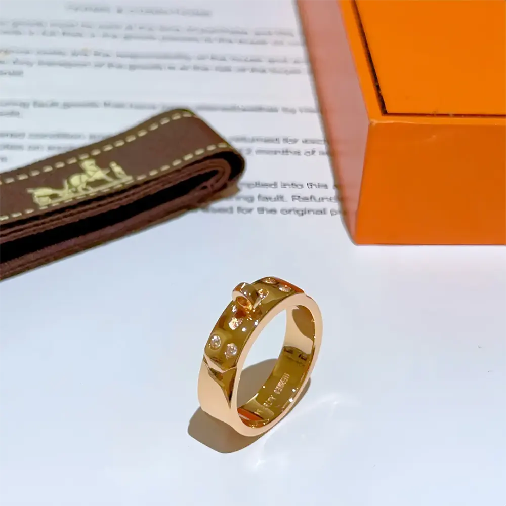 Front angle showing sleek silhouette of Hermes Women Kelly Ring Small Model