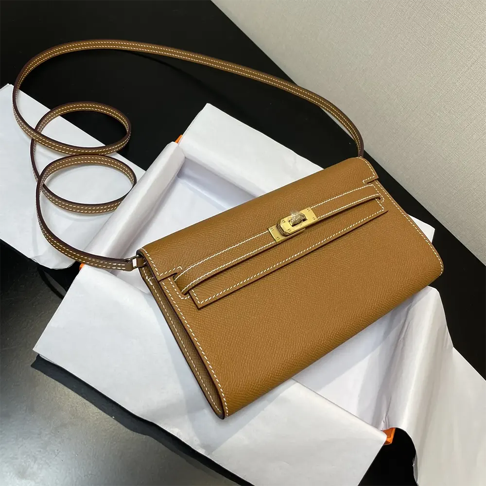 Side profile showing structured silhouette of Hermes Women Kelly To Go
