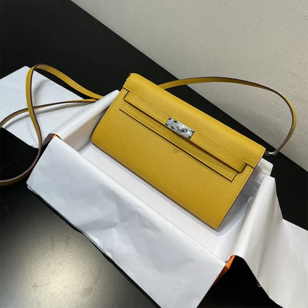 Close-up of gold and silver hardware on Hermes Kelly To Go bag