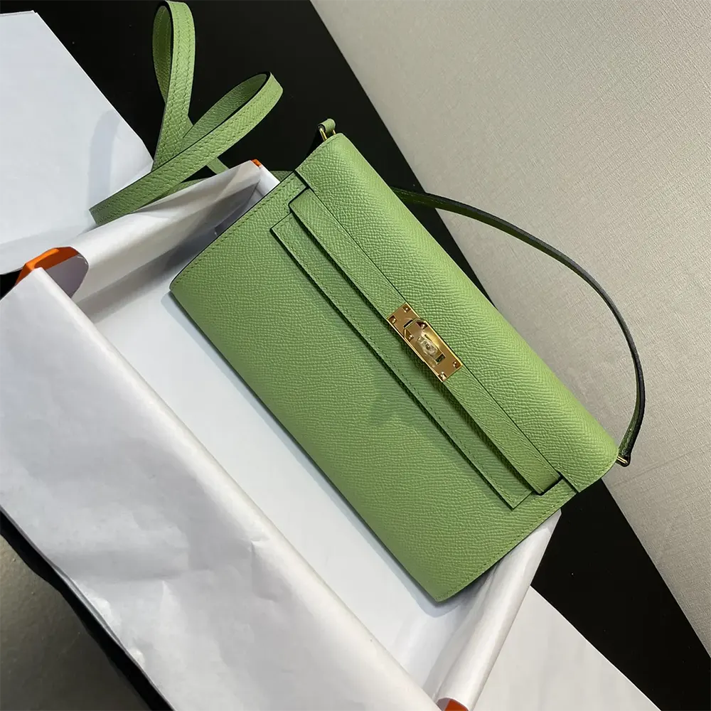 Side angle showing silhouette of Hermes Women Kelly To Go purse