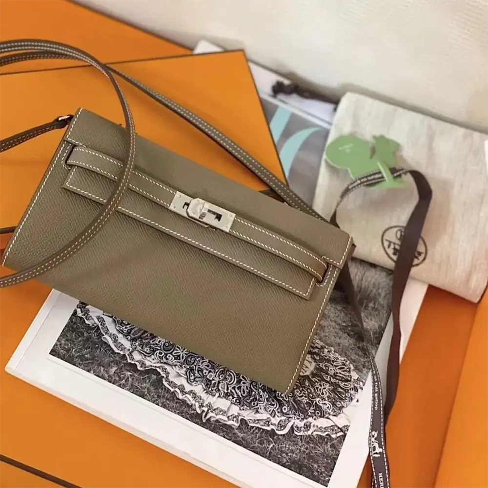 Close-up of silver hardware lock on Hermes Women Kelly To Go bag