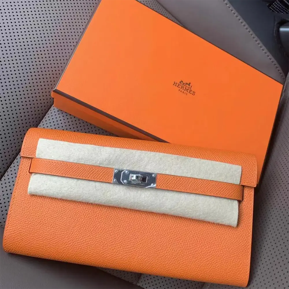 Close-up of silver-tone closure on Hermes Women Kelly To Go bag
