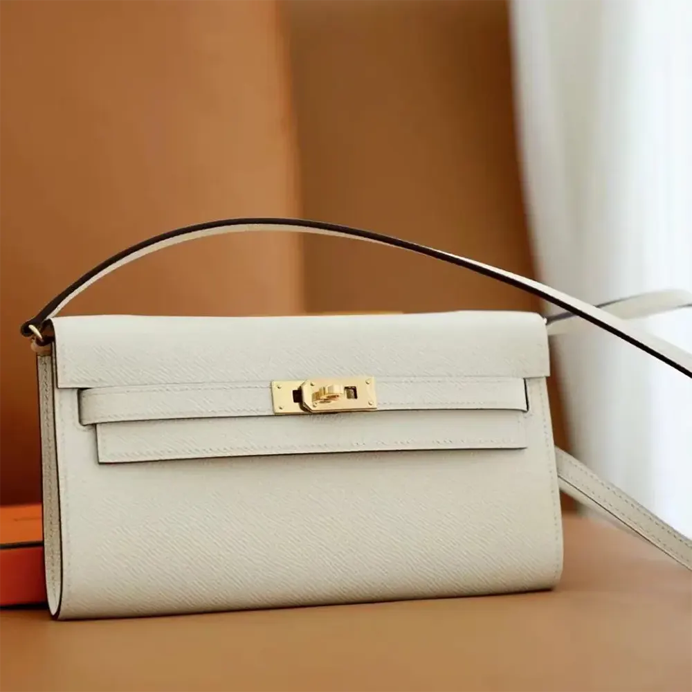 Close-up of gold clasp and leather texture on Hermes Women Kelly To Go