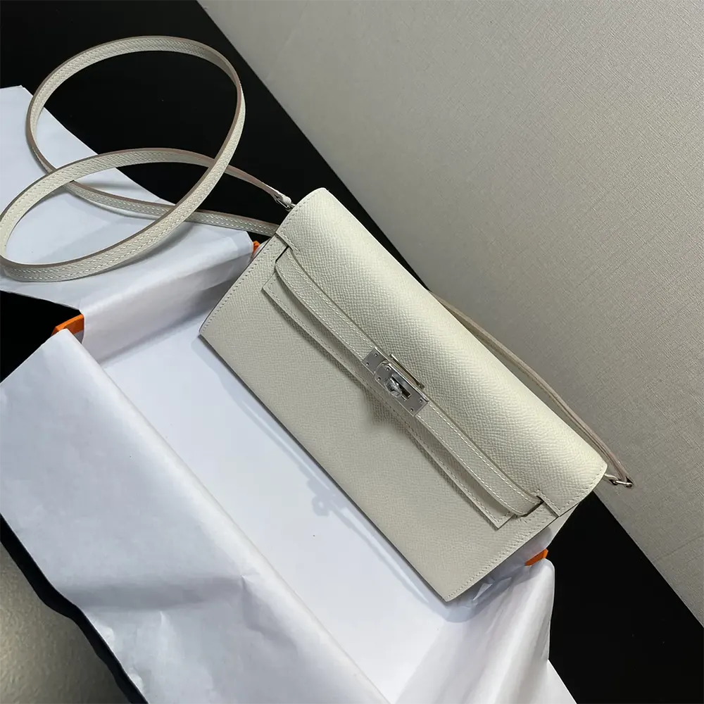 Side profile showing slim silhouette of Hermes Women Kelly To Go shoulder bag