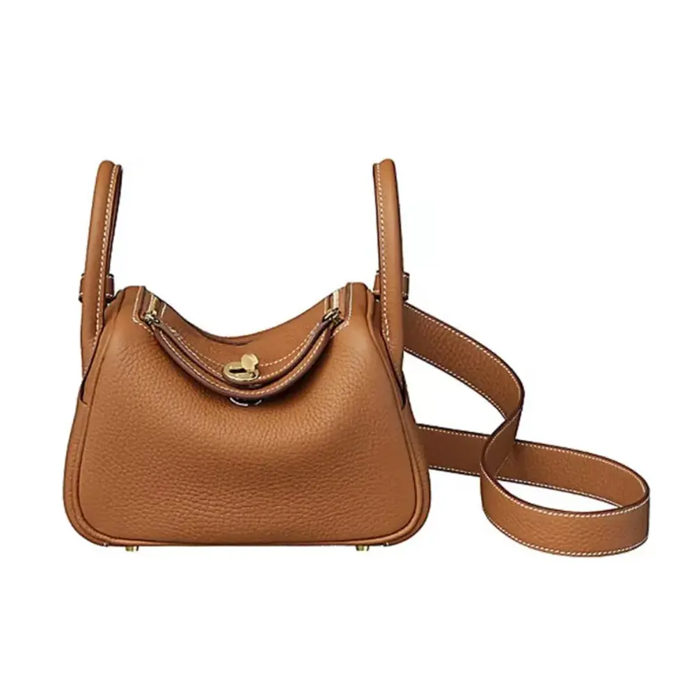 Front view of Hermes Women Lindy Mini 19 in brown Clemence leather